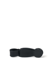 Clip porta sombrero ideal para viajes, redondo en color negro. Hecho de Silicona.