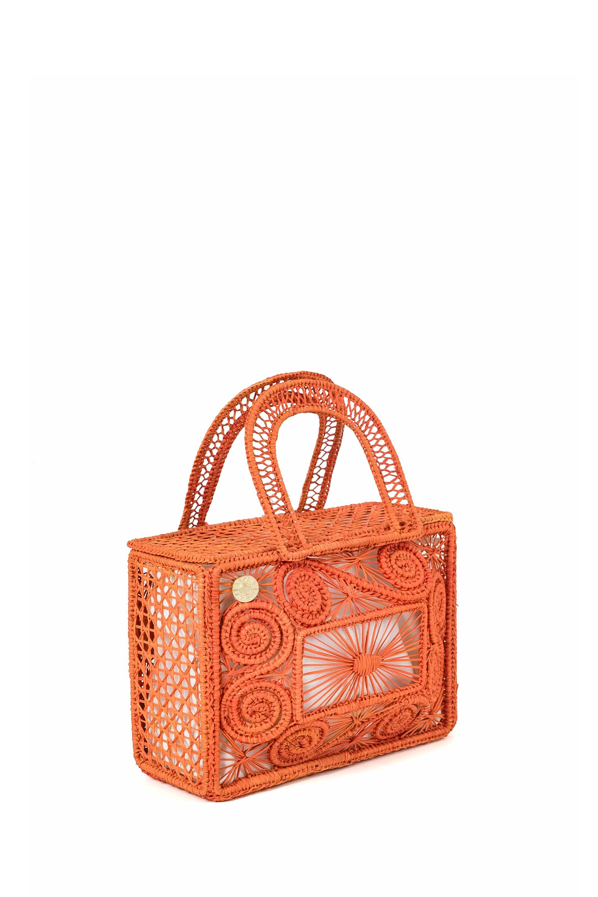 Canasta Stella en color Terracota. Hecha de Palma de Iraca, con forro interior removible.